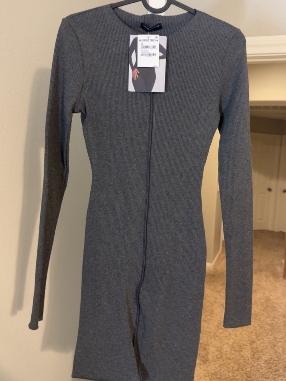 Naked wardrobe long sleeve dress.